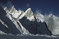 Iced-up rock spires after storm rise above Baltoro Glacier, Karakoram Mountains, Pakistan