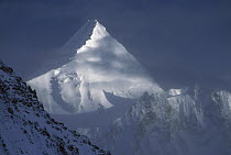 Angel Peak beside K2, second highest peak in the world towering above Godwin Austen Glacier, Karakoram Mountains, Pakistan