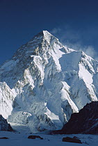 K2 at dawn at 8,611 meters is the second highest peak in the world, seen from camp below Broad Peak, Godwin Austen Glacier, Karakoram Mountains, Pakistan