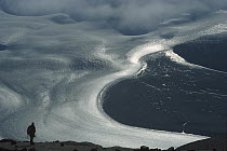 Climber above Webb Glacier, dry valleys, Transantarctic Mountains, Antarctica
