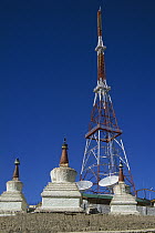 Satellite tower and chortens, showing contrast between ancient and modern near Leh, Ladakh, northwest India