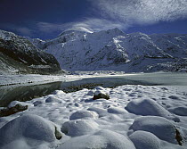 Winter snow on boulders, Mt. Sefton above Mueller glacier, Mount Cook National Park, Southern Alps, New Zealand
