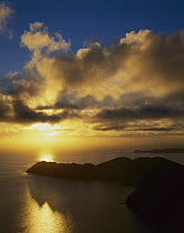 Sunrise over Cape Jackson, outer Marlborough Sounds, New Zealand