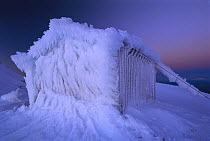 Ice encrusted Syme hut on Fatham's Peak, Mount Egmont National Park, New Zealand
