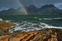 Storm clouds and rainbow, Coles Bay, Freycinet National Park, Tasmania, Australia