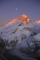 Moon over summit of Mount Everest and Khumbu Glacier, Sagarmatha National Park, Nepal
