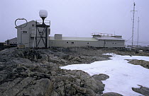 Argentine research station shrouded in fog, Penola Strait, Antarctica