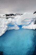 Ice floes showing significant amount of ice beneath the water, Antarctica