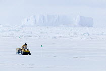 Snowmobile on ice field, Antarctica
