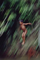 Ianomami child diving, Amazon ecosystem, Brazil