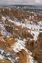Panoramic view of erosional formations called hoodoos and fins after spring snowfall, Bryce Canyon National Park, Utah