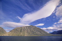 Cirrus and cumulus clouds over the coastal Torngat Mountain, summer, Nachvak Fjord, site of proposed national park, Labrador Sea, Newfoundland, Canada