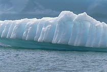 Details of iceberg showing grooves created by rising air bubbles, summer season, near Saint Anthony, Newfoundland, Canada