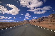 Highway and spring cumulus clouds near Marble Canyon, northern Arizona