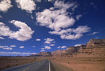 Highway and spring cumulus clouds near Marble Canyon, northern Arizona