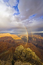 Double rainbow and dramatic clouds over canyons, buttes, cliffs and plateaus of Grand Canyon in evening, Kanab Point, Grand Canyon National Park, Arizona