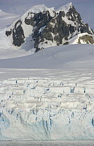 Coastal glacier descending to sea, Grandidier Passage, western Antarctica