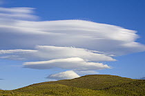 Lenticular clouds above arid steppe, Torres del Paine National Park, Patagonia, Chile