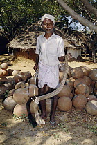 Irula Tribe member and professional snake catcher for venom extraction, India