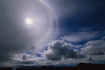 Sun halo, caused by ice crystals in high clouds, Iceland