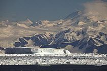Iceberg trapped in pack ice, Admiralty Range, Antarctica