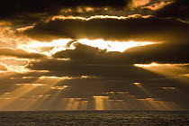 Sunset breaking through clouds, Macquarie Island, Subantarctic, Australia