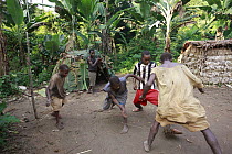 Baka soccer match with a ball made from leaves, Cameroon