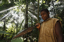 Baka man hunting, Cameroon