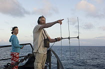 Blue Whale (Balaenoptera musculus) researchers John Calambokidis and Erin O'Brien tracking whales, Costa Rica