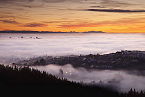 Smog and early winter cloud inversion layer at dawn blankets central city, Christchurch, Canterbury, New Zealand