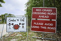 Signs for annual red crab migration, Christmas Island, Australia