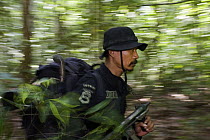 Rhino protection unit personnel patrolling in Way Kambas National Park, Sumatra, Indonesia