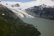 Glacier showing medial moraines and glacial lake, Katmai, Alaska