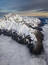 Mount Tutoko at dawn, 2723 meters, is the highest peak in Darran Mountains, Hollyford Valley, Fiordland National Park, New Zealand