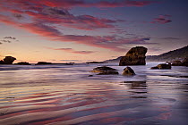 Sunset on beach north of Punakaiki, Paparoa National Park, New Zealand