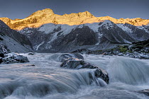 Mount Sefton at dawn with Hooker River flowing from Mueller Glacier, Mount Cook National Park, New Zealand