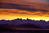 Sunrise behind mountains above Chilkoot Inlet, Haines, Alaska