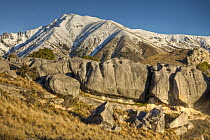 Boulders of Prebble Hill with Torlesse Range behind, Castle Hill Basin, Canterbury, New Zealand