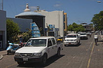Cars on Charles Darwin Avenue, Puerto Ayora, Santa Cruz Island, Galapagos Islands, Ecuador