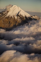 Mount Taranaki showing western flanks of dormant volcano above clouds, New Zealand