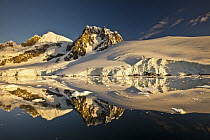 Lemaire Channel reflection at sunset, Antarctic Peninsula, Antarctica