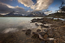 Evening light and clouds at Lago Pehoe with Cuernos del Paine above, Torres Del Paine National Park, Patagonia, Chile