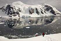 Climbers descend Peon Peak, Ronge Island, Antarctic Peninsula, Antarctica