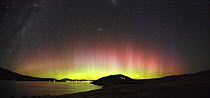 Night sky and southern lights over Lake Tekapo and village, Mackenzie Country, New Zealand