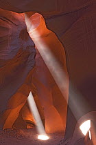 Eroded sandstone and rays of sunlight in Antelope Canyon, Arizona