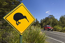 Kiwi crossing sign along roadside, near tourist town of Rotorua, North Island, New Zealand