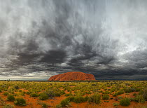 Ayers Rock and storm clouds, Uluru-kata Tjuta National Park, Northern Territory, Australia