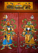 Mural of Buddhist guardians on hotel door, Ulan Baatar, Mongolia
