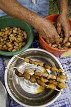 South American Palm Weevil (Rhynchophorus palmarum) larvae harvested for consumption from Yasuni National Park, Pompeya Market, Amazon, Ecuador