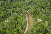 Maxus Road, originally an oil road and buildings showing colonization of rainforest, Yasuni National Park, Amazon, Ecuador